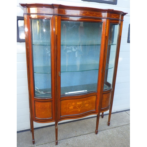 680 - An Edwardian mahogany & inlaid display cabinet with serpentine glass door, 138cm wide, 183cm tall