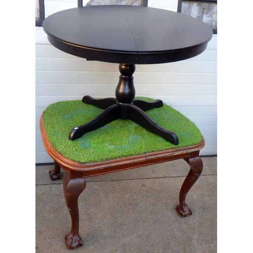 686 - An extending dining table with astro turf top together with a circular black dining table, top loose... 