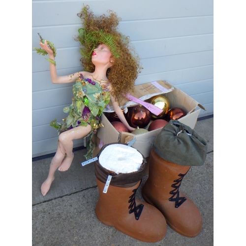 688 - A figure of a fairy, large pair of polystyrene display boots and a qty of baubles