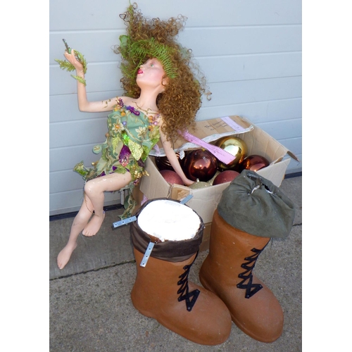 688 - A figure of a fairy, large pair of polystyrene display boots and a qty of baubles