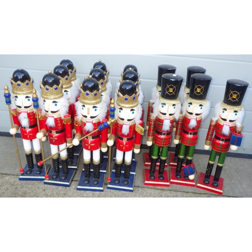 689 - A qty of fifteen nutcracker figures, some missing parts, 50cm tall