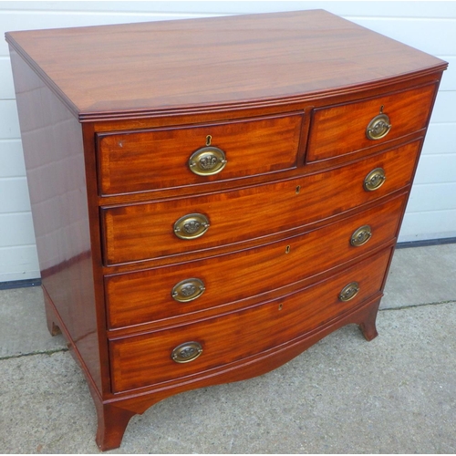 692 - A reproduction mahogany crossbanded bowfronted chest of drawers, 92cm wide