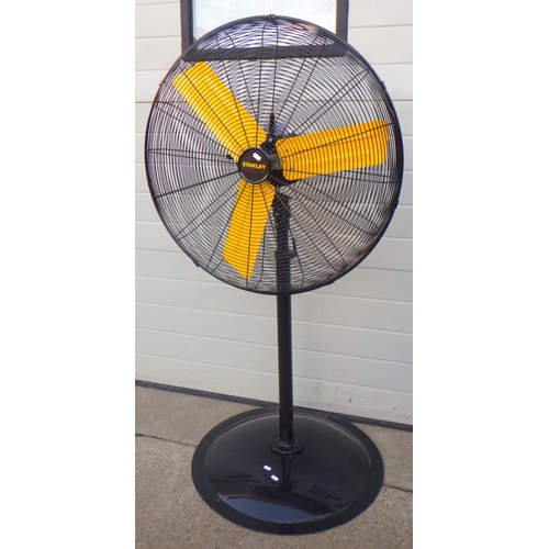 704 - A large Stanley floorstanding fan