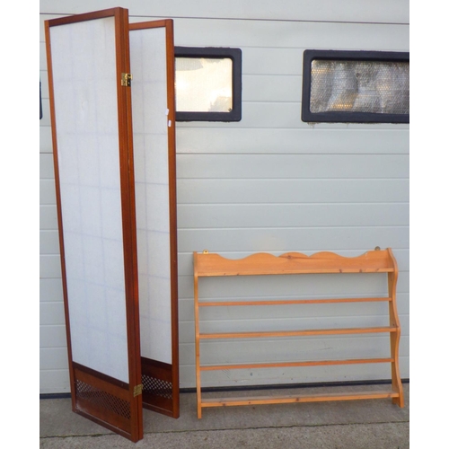 708 - A three panel screen together with a set of pine hanging shelves (2)