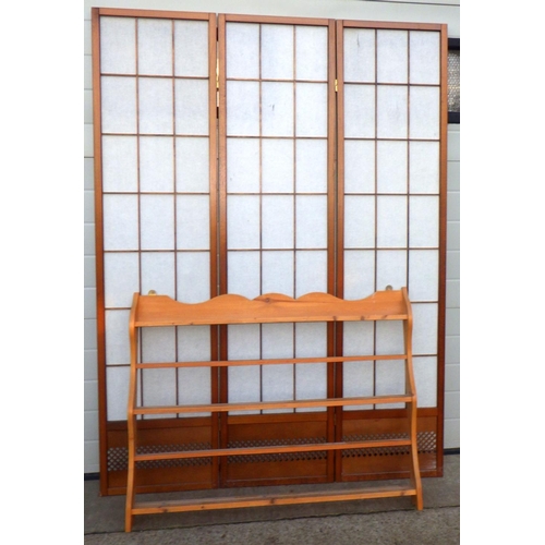 708 - A three panel screen together with a set of pine hanging shelves (2)