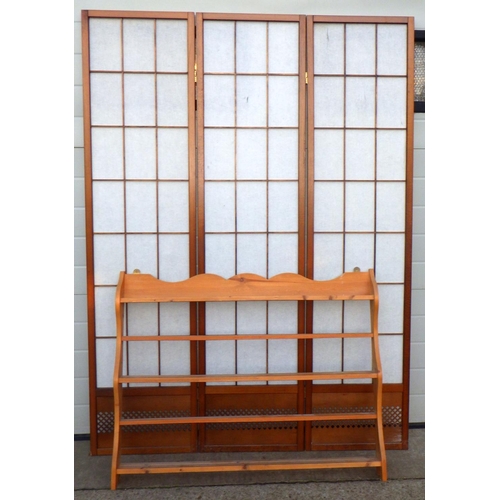 708 - A three panel screen together with a set of pine hanging shelves (2)