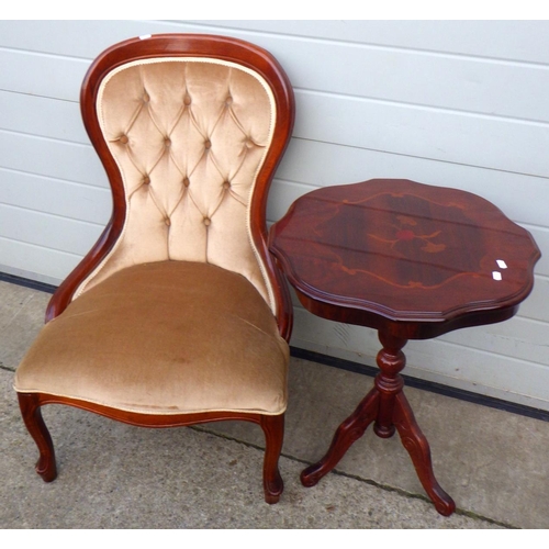 710 - A reproduction nursing chair together with an occasional table (2)