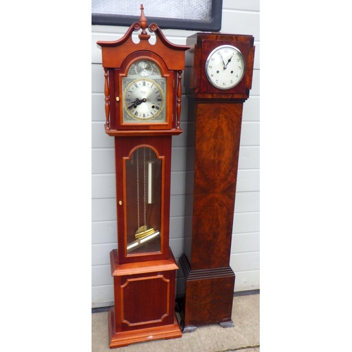 714 - A 1930's walnut Grand daughter clock together with a Tempus Fugit Grand daughter clock (2)