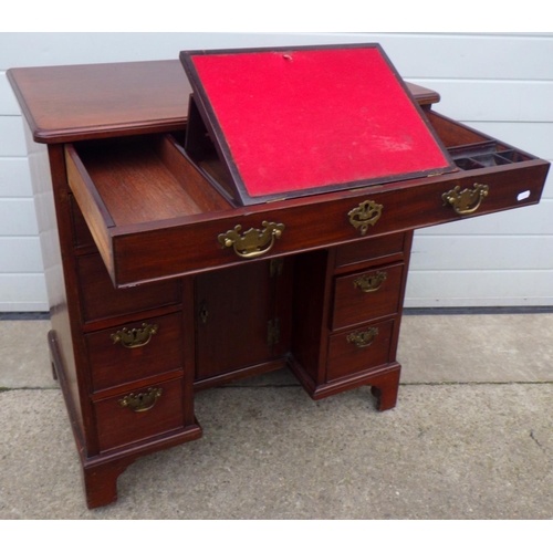 716 - A Geo III style mahogany kneehole desk with fitted top drawer, 81cm wide