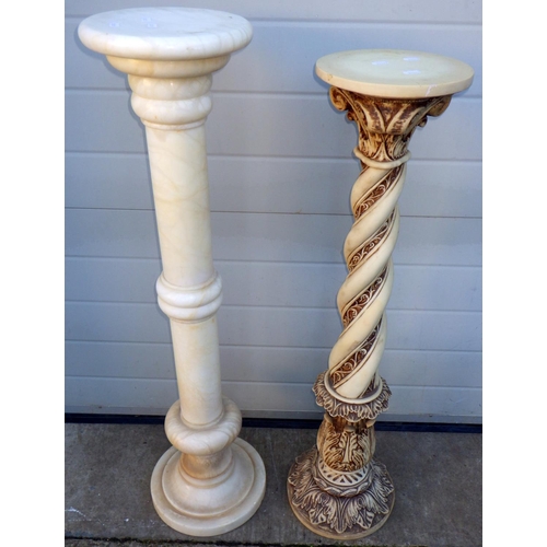 719 - A turned alabaster column, 104cm tall, together with a carved column (2)