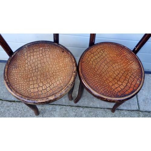 722 - A pair of mock crocodile bentwood chairs, with label Fischel, Czechoslovak State