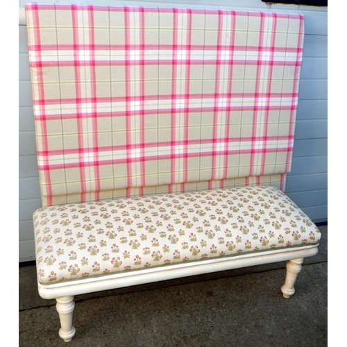 727 - A long white painted upholstered stool together with a padded headboard, 137cm wide (2)