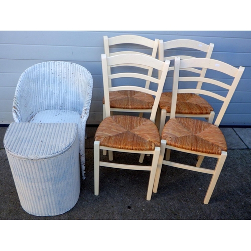 738 - A Lloyd Loom tub chair together with a linen basket and set of four rush seated dining chairs (6)