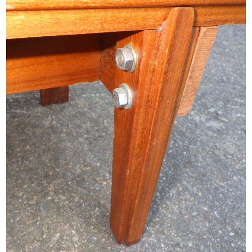 749 - A teak sideboard, 141cm wide together with a low bookcase, feet repaired and a corner cabinet (3)