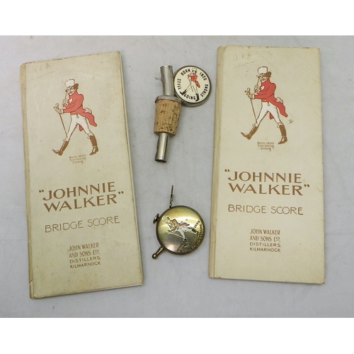 309 - A Johnnie Walker bowls steel tape measure; two Johnnie Walker bridge scorer books, etc