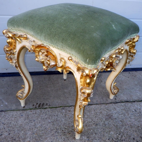 763 - A painted & gilt stool with overstuffed seat on cabriole legs