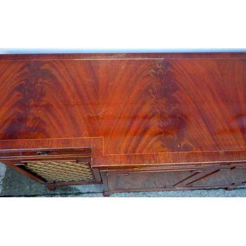 764 - A reproduction mahogany four door , breakfront sideboard with end grille doors, marks , 152cm long