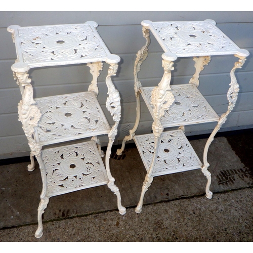 765 - A pair of painted aluminium three tier stands