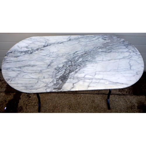 766 - A marble topped cafe table on metal base, 120cm long