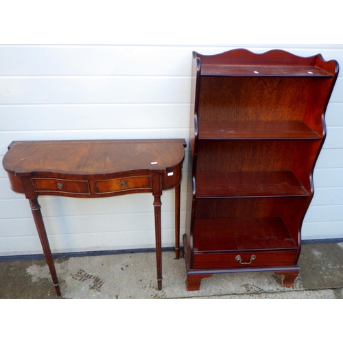 771 - A reproduction mahogany waterfall bookcase together with a side table, marks (2)