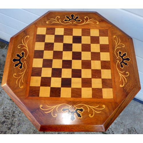 773 - WITHDRAWN - A Victorian octagonal walnut work table with chessboard top, 46cm across