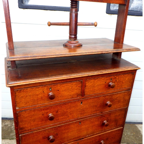 790 - An early 19th cen oak straight fronted chest of drawers with a screw press top, later knob handles, ... 