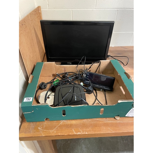 792 - A Finlux 21” tv/ dvd player together with a dvd player etc