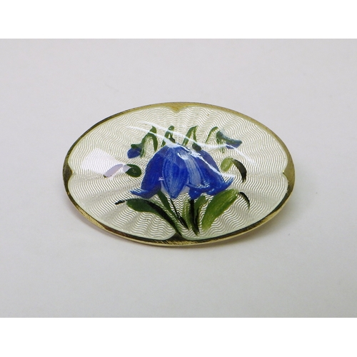 45 - Two David-Andersen panel brooches, white metal and enamel, each 44 x 34mm; another Norwegian white m... 