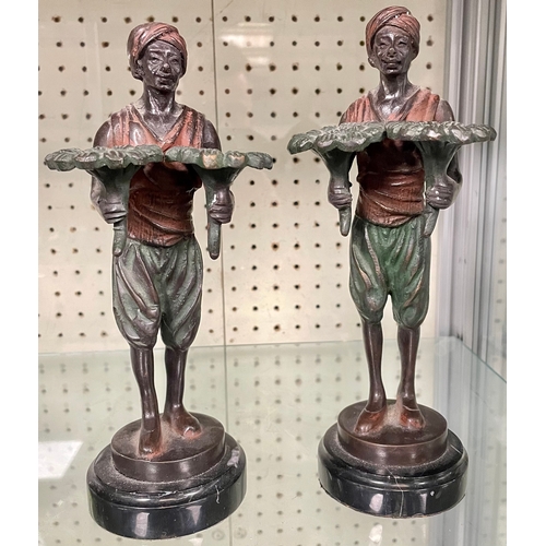 113 - Pair of figural candlesticks casted as middle eastern men, stamped F. Bergmann 1892