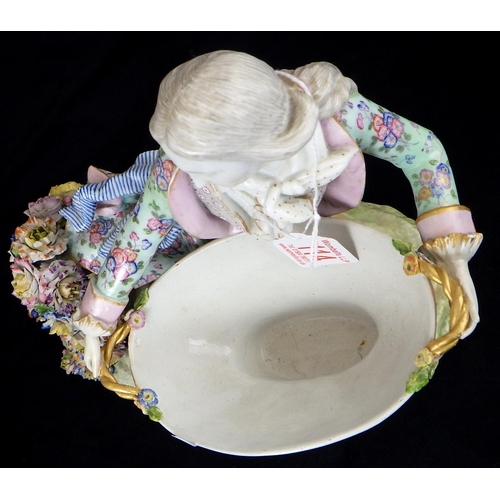 114 - A large restored Meissen centre piece together with a 