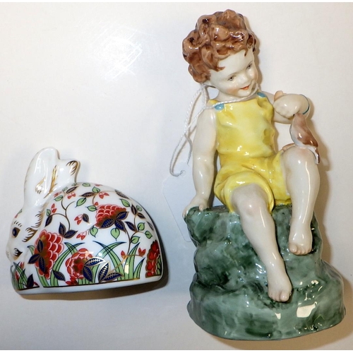98 - A royal Worcester Friday's Child figure together with a Crown Derby (2nd) rabbit paperweight (2)