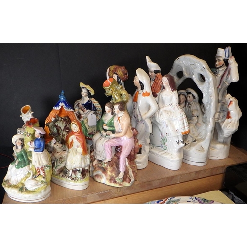 123 - A qty of misc Staffordshire figures & spill vases  AF