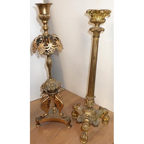 133 - Two cast metal candlesticks together with a pair of stands and an ormulu urn (5)