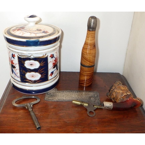 134 - An oak smokers cabinet together with a pipe etc