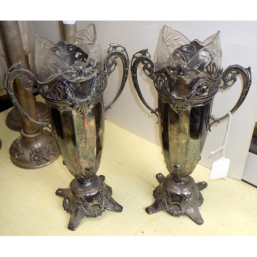 140 - A pair of etched glass hurricane lamps together with a pair of candlesticks and two pairs of spill v... 