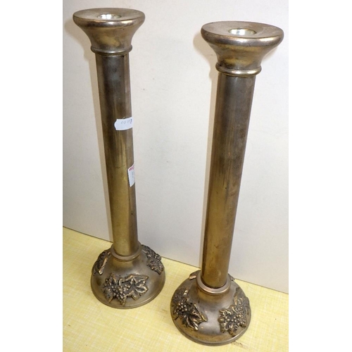 140 - A pair of etched glass hurricane lamps together with a pair of candlesticks and two pairs of spill v... 