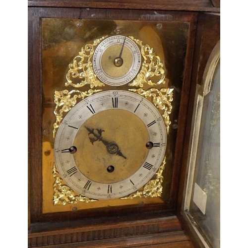 142 - An Edwardian oak case Westminster chime bracket clock