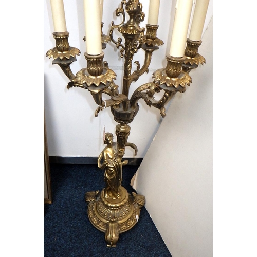 149 - A large heavy cast candelabra 75cm tall