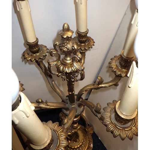 149 - A large heavy cast candelabra 75cm tall