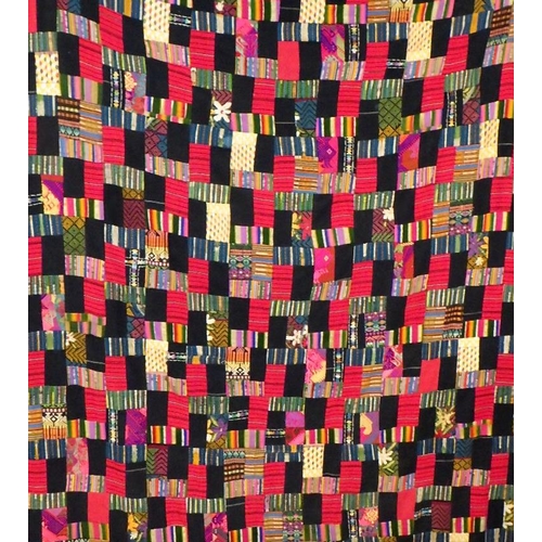 156 - A large patchwork throw