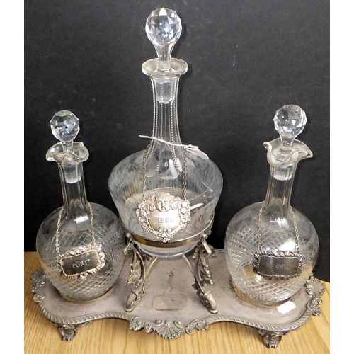 161 - A group of various decanters together with a silver plated stand