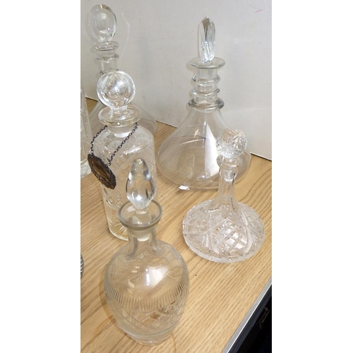 161 - A group of various decanters together with a silver plated stand