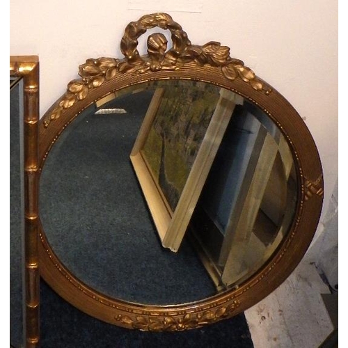 168 - A small circular bevelled mirror together with two further mirrors (3)