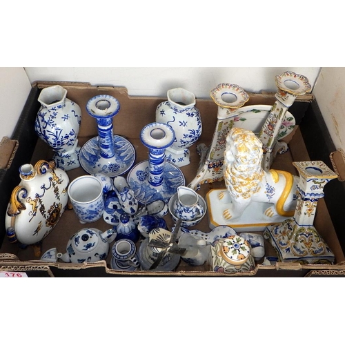 176 - A group of misc Delft style pottery to inc candlesticks, modern lion etc