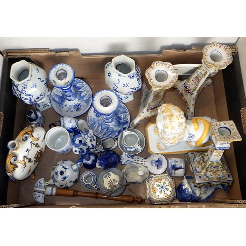 176 - A group of misc Delft style pottery to inc candlesticks, modern lion etc