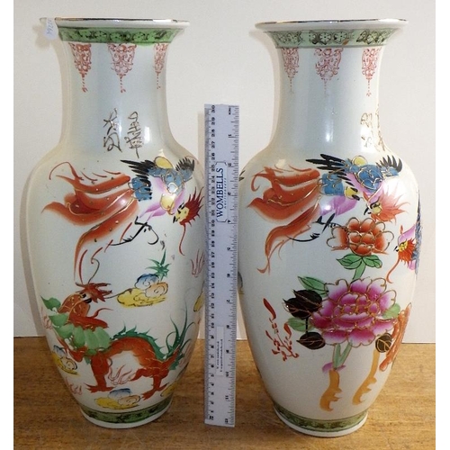 211 - A pair of modern Oriental vases 39cm tall