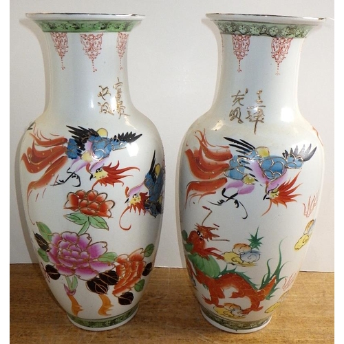 211 - A pair of modern Oriental vases 39cm tall