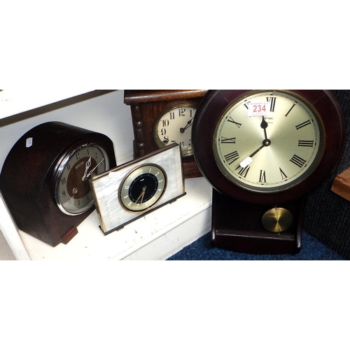 234 - A group of four various clocks