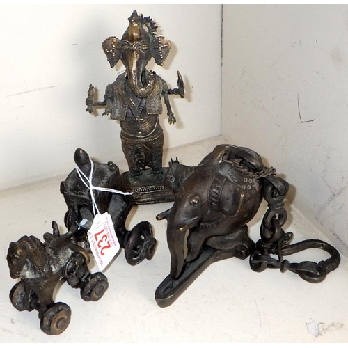 237 - A cast and filled figure of Ganesh together with a bronzed elephant and horse and carriage (3)