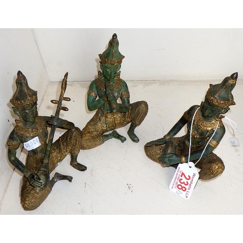 238 - Three cast metal Asian musician sculptures